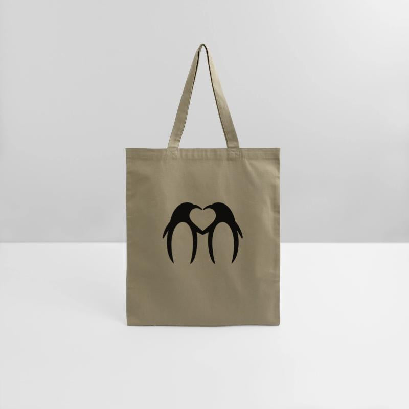 Two penguins form a heart